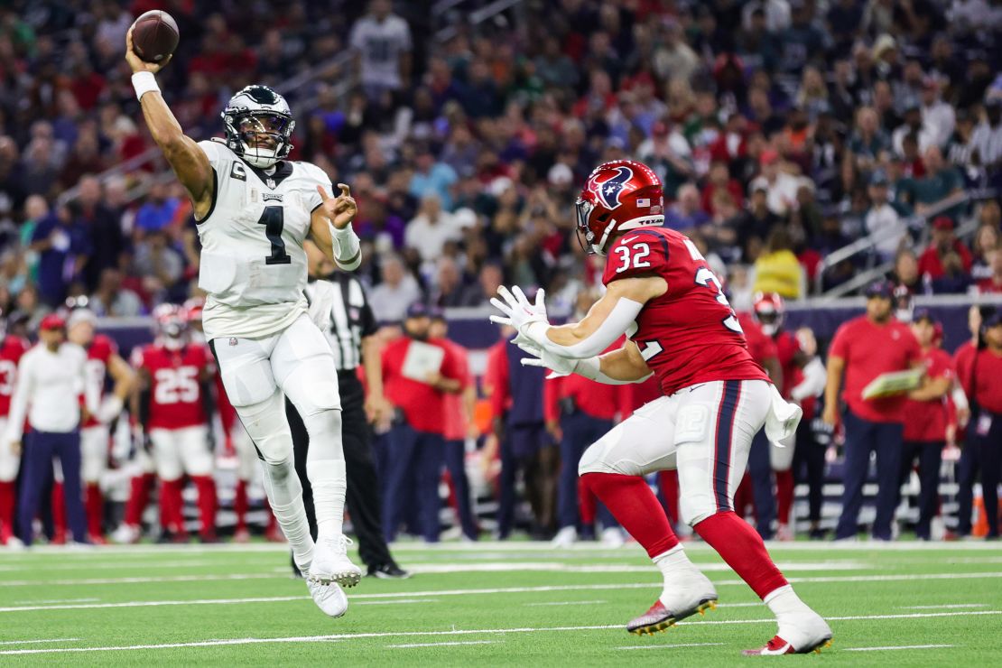 Hurts throws during the second half against the Texans.