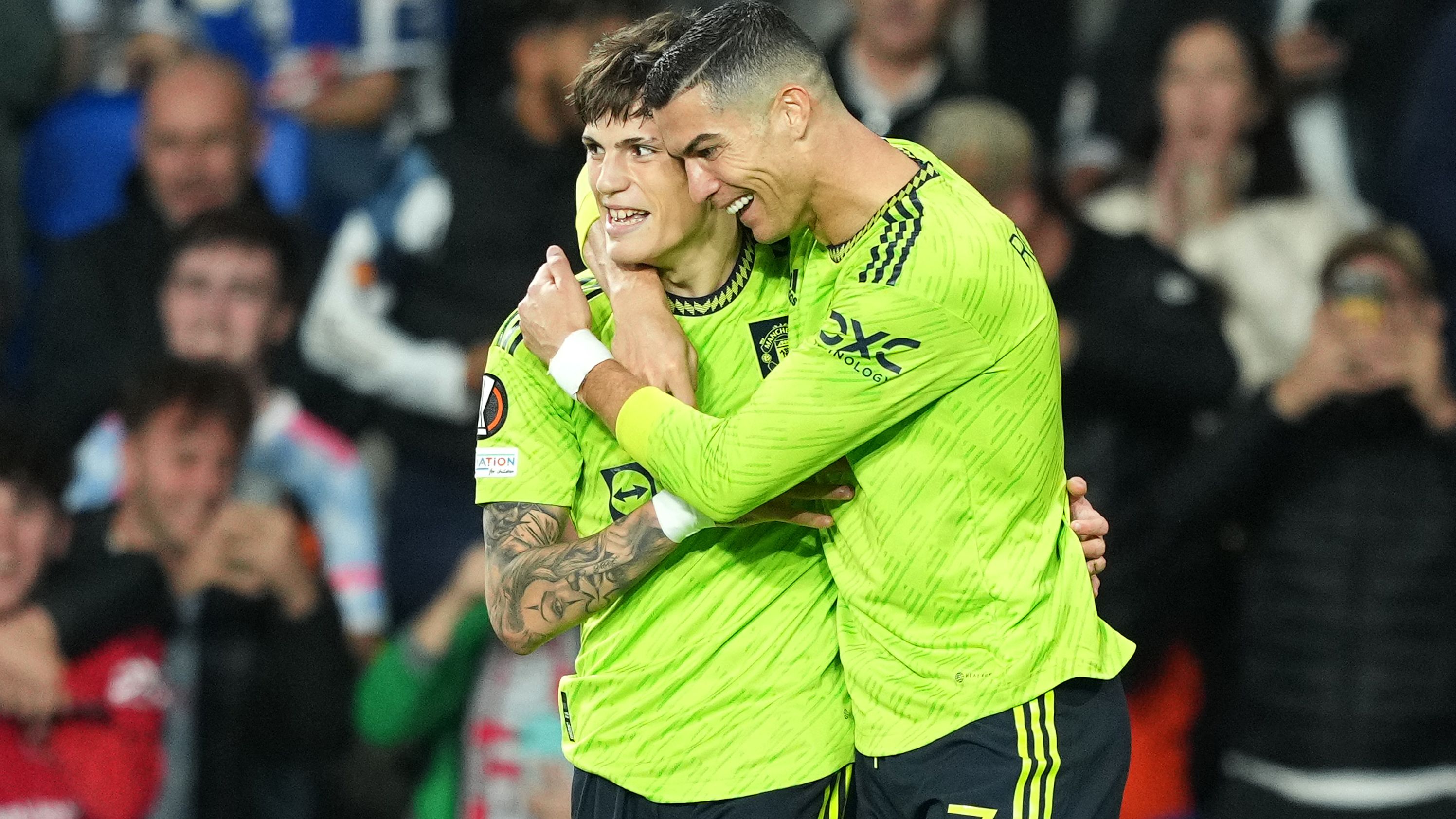 Garnacho celebrates with teammate Cristiano Ronaldo who provided the assist. 