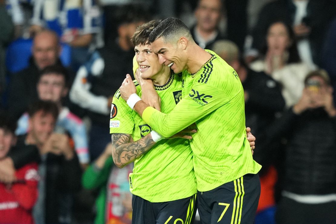 Garnacho celebrates with teammate Cristiano Ronaldo who provided the assist. 