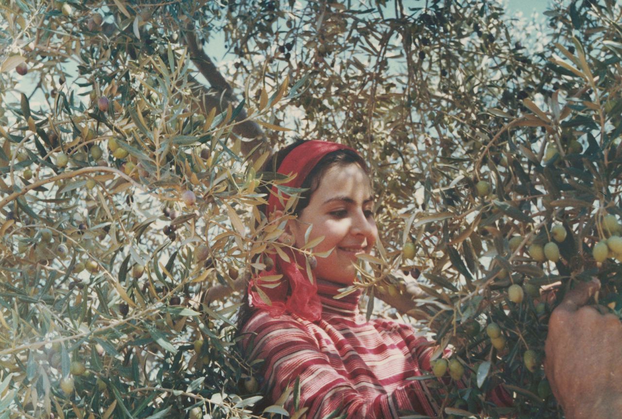 A young Juana Martini, pictured in one of her family's olive farms.