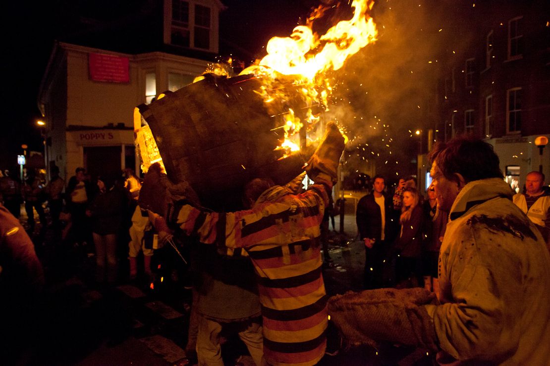 A photograph of a past  running of the tar barrels in Ottery St Mary in Devon, England.
