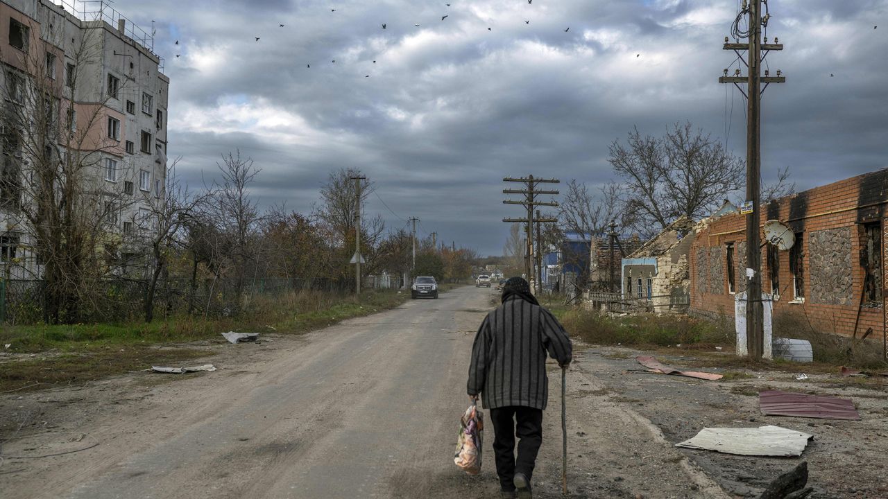 An old woman walks in the Kherson region Much of the Kherson region has been in Russian control since the early weeks of its invasion.