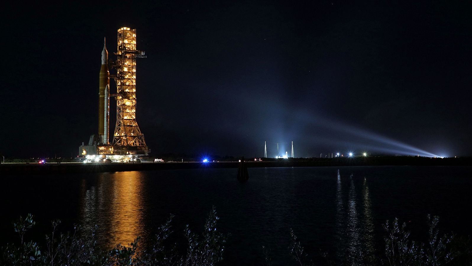 The Artemis-1 rocket is rolled out from the Vehicle Assembly Building en route to Launch Pad 39B shortly after midnight at the Kennedy Space Center in Florida on November 4.