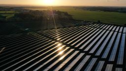 An overhead view shows the photovoltaic (PV) solar panels making up Manston Solar Farm, in south-east England on November 4, 2022.