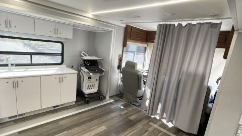 The mobile clinic has a waiting room, laboratory space and two examination rooms.