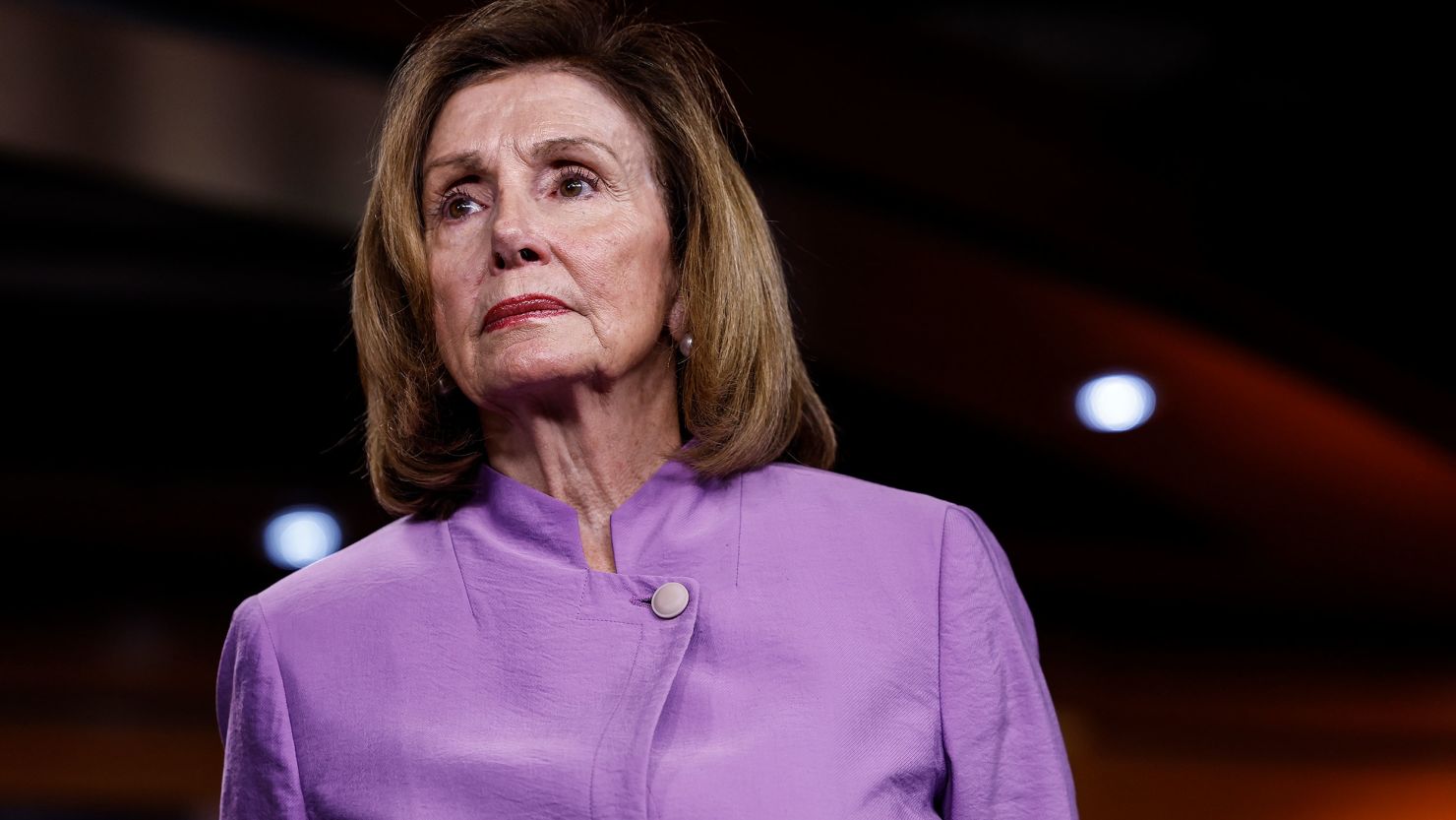 House Speaker Nancy Pelosi is seen in August alongside members of Congress at a news conference in the US Capitol Building in Washington, DC. 