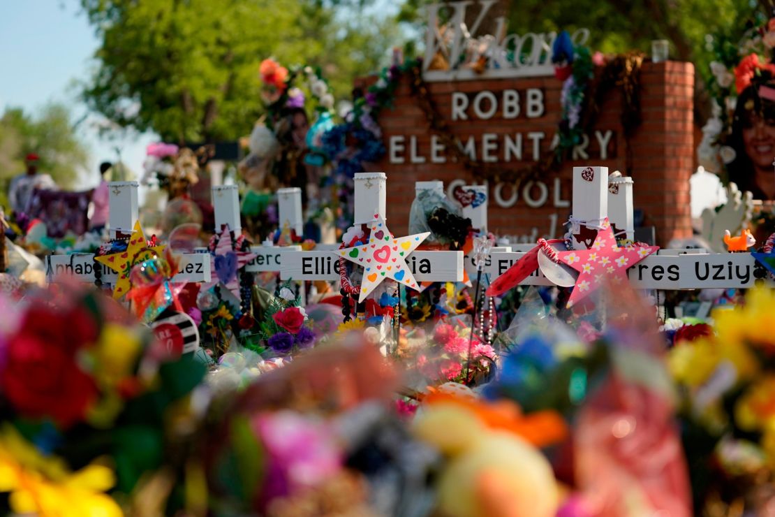A makeshift memorial sits in front of the Robb Elementary School.  