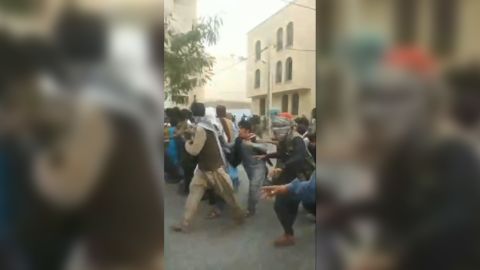 Video shared with CNN by activist outlet IranWire appear to show protesters running in Khash, southeast Iran on Friday.