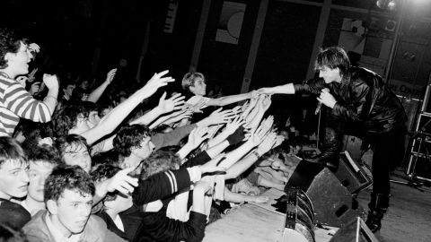 Bono and U2 perform in Belfast, Ireland, in 1982.