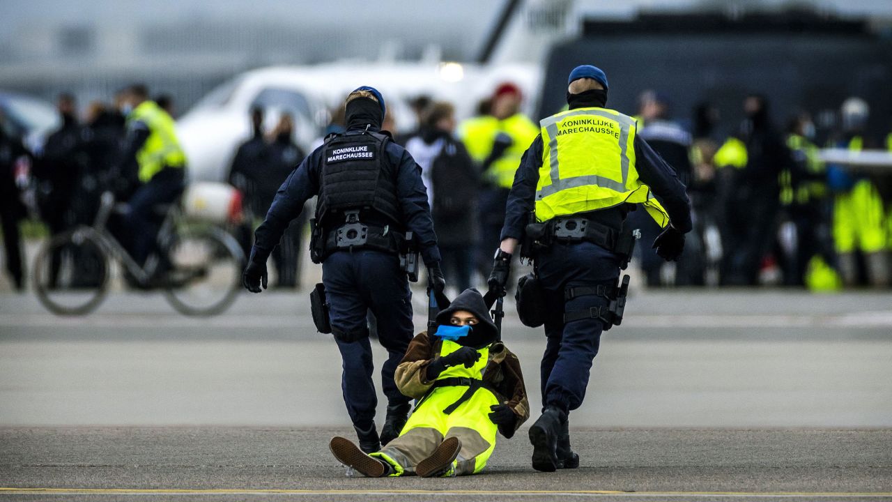 Hundreds of climate protesters staged a huge scale demonstration and blocked a runway at Schiphol airport in the Netherlands on Saturday.