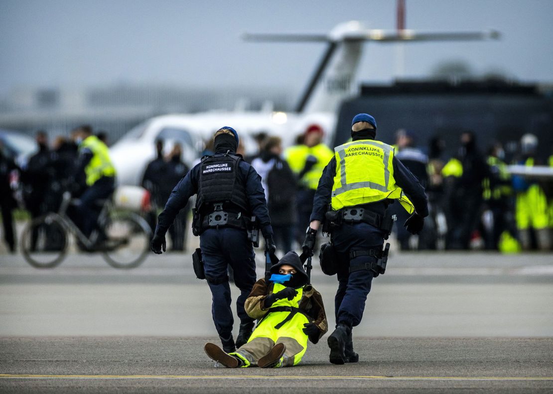 Hundreds of climate protesters staged a huge scale demonstration and blocked a runway at Schiphol airport in the Netherlands on Saturday.