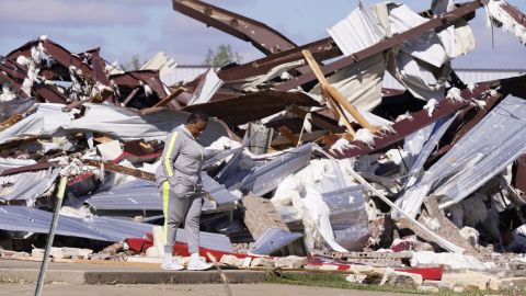 Adela Cox looks at the Trinity Baptist Church that was destroyed by a tornado in Idabel, Oklahoma, Saturday, Nov. 5, 2022.