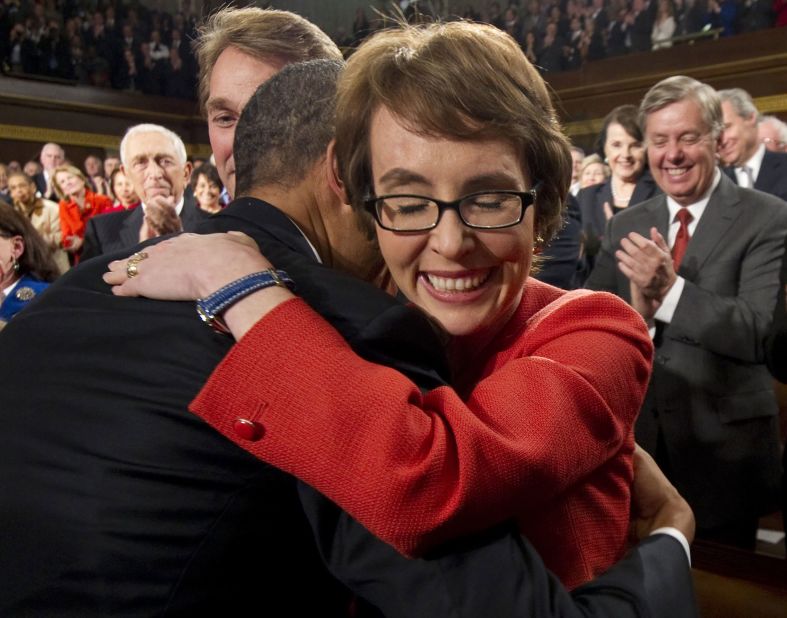 President Barack Obama embraces Giffords before his State of the Union address in January 2012.