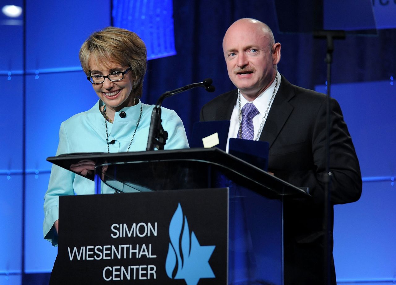 Giffords and Kelly speak at the Simon Wiesenthal Center's annual tribute dinner, where they received Medals of Valor in May 2012.