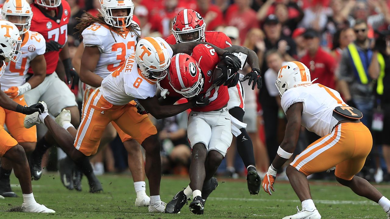 Georgia Bulldogs running back Daijun Edwards (#30) carries the football for a first down during Saturday's game against the Tennessee Volunteers.