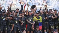 Carlos Vela #10 of LAFC lifts the trophy to celebrate with his teammates after winning the MLS Cup Final match between Philadelphia Union and LAFC as part of the MLS Cup Final 2022 at Banc of California Stadium on November 5, 2022 in Los Angeles, California.