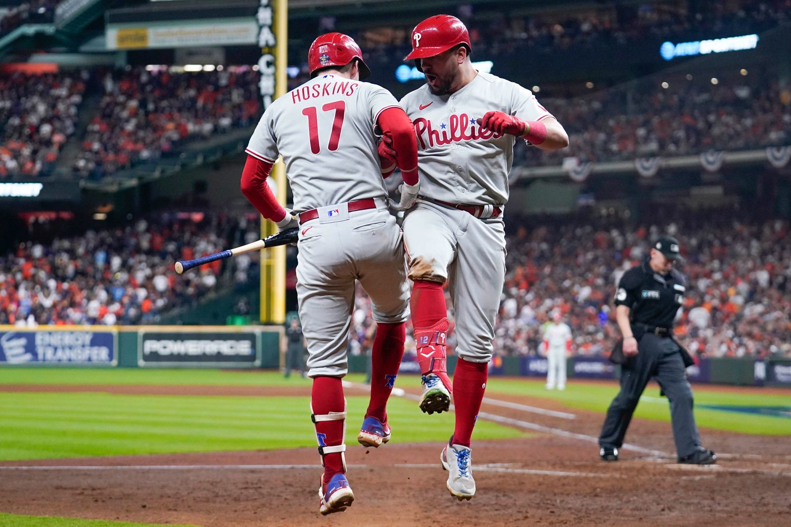 Schwarber celebrates his home run with teammate Rhys Hoskins on Saturday.