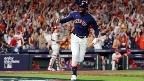 Yordan Alvarez #44 of the Houston Astros hits a three-run location  tally  against the Philadelphia Phillies during the sixth inning successful  Game Six of the 2022 World Series.