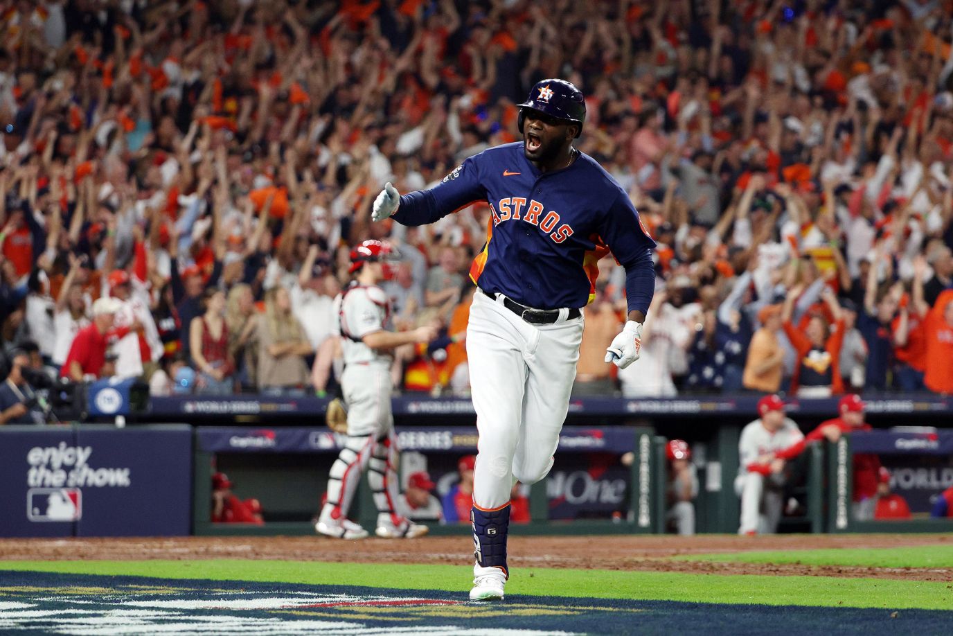 Houston Astros Unsigned 2022 MLB World Series Champions Team Dogpile Photograph