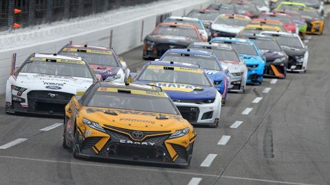Christopher Bell, driver of the #20 DeWalt Toyota, leads the field during the NASCAR Cup Series Xfinity 500 at Martinsville Speedway on October 30, 2022.