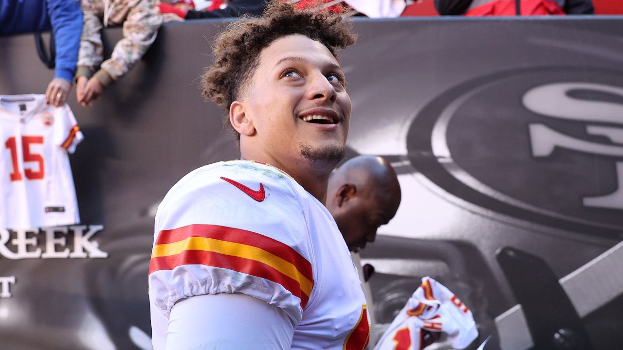 Mahomes smiles at fans while leaving the field after defeating the San Francisco 49ers.