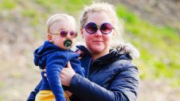 NEW YORK, NEW YORK - MARCH 22: Amy Schumer and Chris Fischer take baby Gene Fischer out for some morning air on March 22, 2020 in New York City. (Photo by Jackson Lee/GC Images)