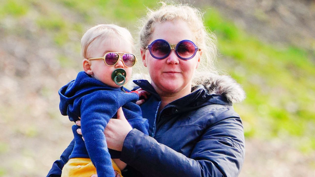 Amy Schumer and her son Gene Fischer take in some morning air on March 22, 2020, in New York City. 