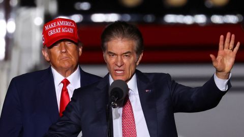Former President Donald Trump looks on as Pennsylvania Republican Senate candidate Mehmet Oz speaks at a rally in Latrobe in 2022.  November 5 