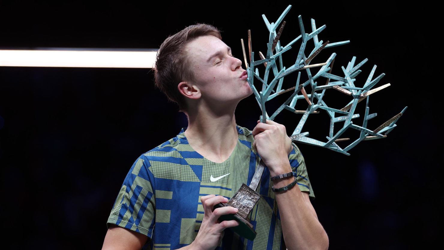Holger Rune celebrates winning the Paris Masters title against Novak Djokovic. 