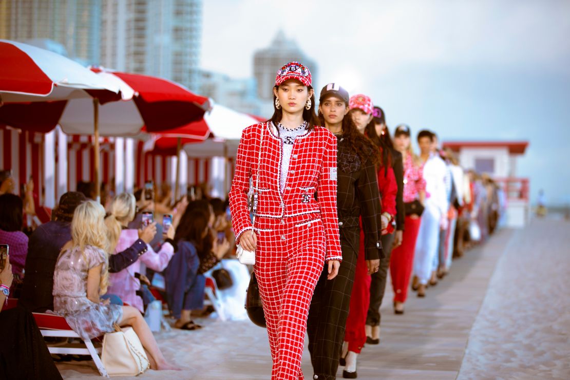 Models parade down the runway for the show's finale.