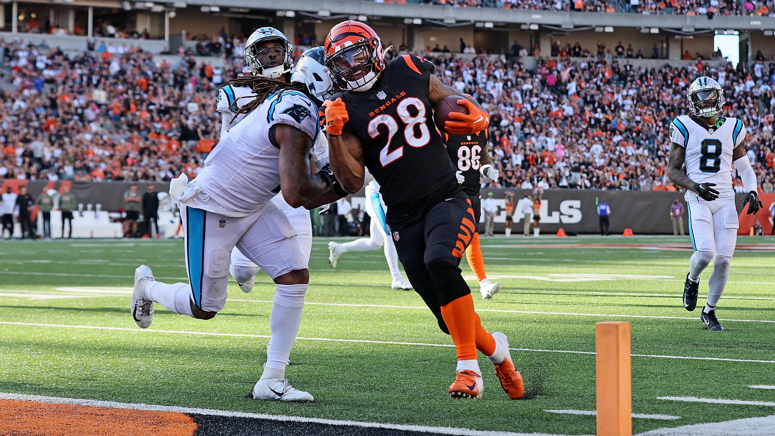 Joe Mixon scores a touchdown for the Cincinnati Bengals during the third quarter against the Carolina Panthers. Mixon scored five TDs in the 42-21 win over the Panthers, breaking the Bengals' record for the most touchdowns in a single game.