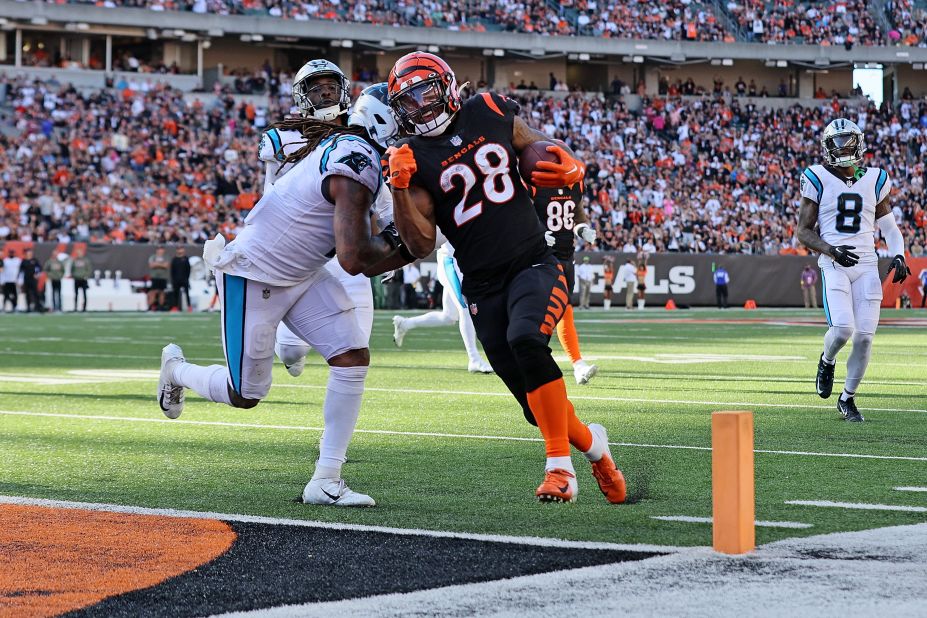 Joe Mixon scores a touchdown for the Cincinnati Bengals during the third quarter against the Carolina Panthers. Mixon scored five TDs in the 42-21 win over the Panthers, breaking the Bengals' record for the most touchdowns in a single game.