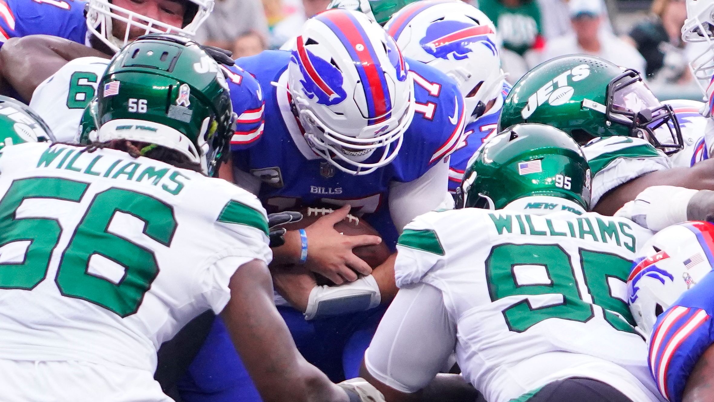 Buffalo Bills quarterback Josh Allen scores a first quarter touchdown against the New York Jets, but the Bills' fast start wasn't enough though, as the Jets fought back and were able to record a huge victory over their high-flying division rivals, 20-17. 