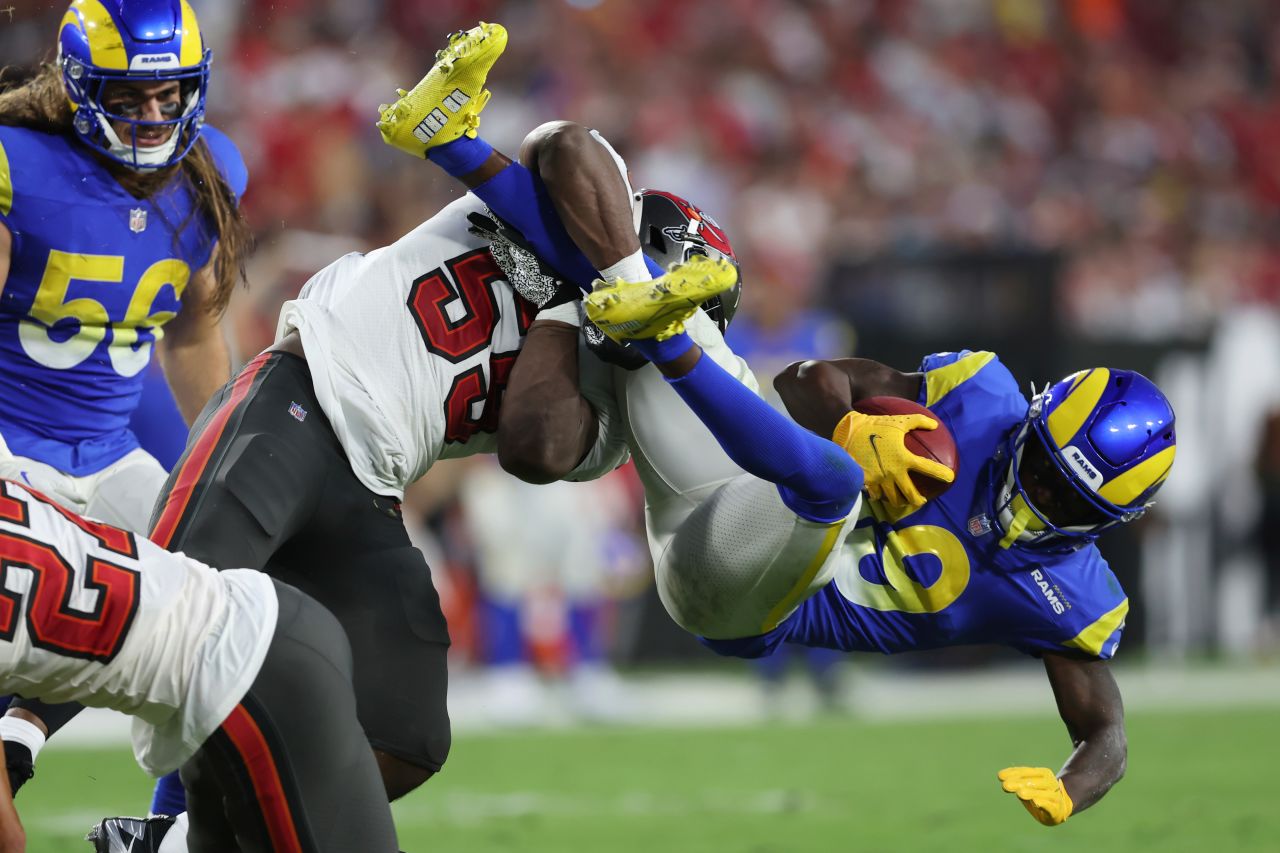 Los Angeles Rams wide receiver Brandon Powell is acrobatically tackled by Tampa Bay Buccaneers linebacker Genard Avery during the first half of their game at Raymond James Stadium. Bucs quarterback <a href="https://www.cnn.com/2022/11/07/sport/tom-brady-100k-passing-yards-bucs-rams-spt-intl/index.html" target="_blank">Tom Brady threw a one-yard touchdown</a> to tight end Cade Otton with 13 seconds left to complete a 16-13 comeback victory over the reigning Super Bowl champions. 
