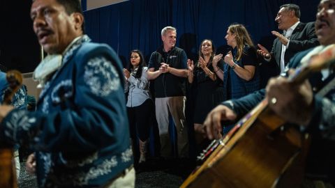 From left to right, Congresswomen Mela Flores, Kevin McCarthy, Republican congressional candidate Monica Dela Cruz and Republican National Committee Chair Rhona McDaniel stand together while Mariah The band played Sunday after an event in McAllen, Texas.