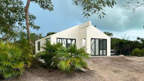 A prototype of Partanna's house, built adjacent to Partanna's building materials factory in Bacardi, Bahamas. 
