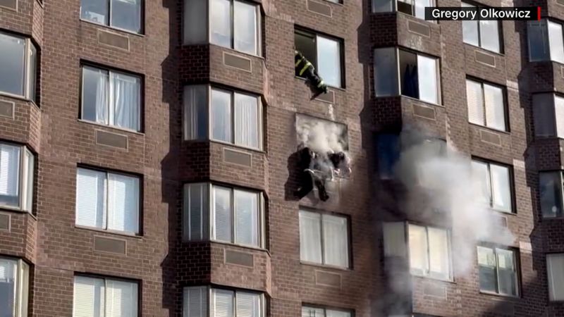 Firefighters Rescue Woman Dangling From 20th-story Window | CNN