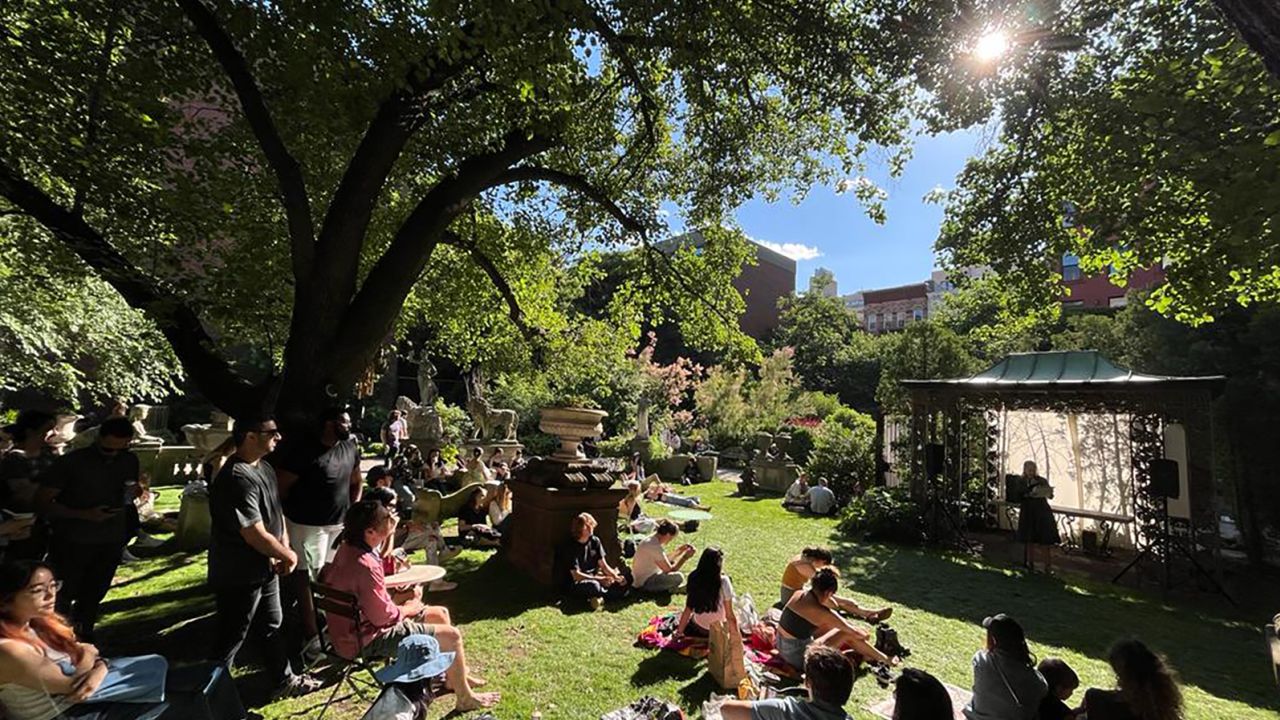 New Yorkers gathered in Elizabeth Street Garden for afternoon music in the main green space, where public events are often held.