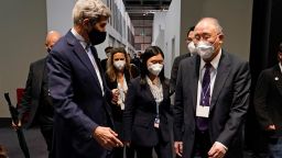China's chief negotiator Xie Zhenhua, right, walks with John Kerry, United States Special Presidential Envoy for Climate at the COP26 U.N. Climate Summit in Glasgow, Scotland, Friday, November 12, 2021.
