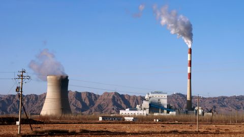 Smoke rises from the chimney of a coal-fired power plant in China's Gansu province in February.  China and the United States have historically been the largest emitters of greenhouse gases.