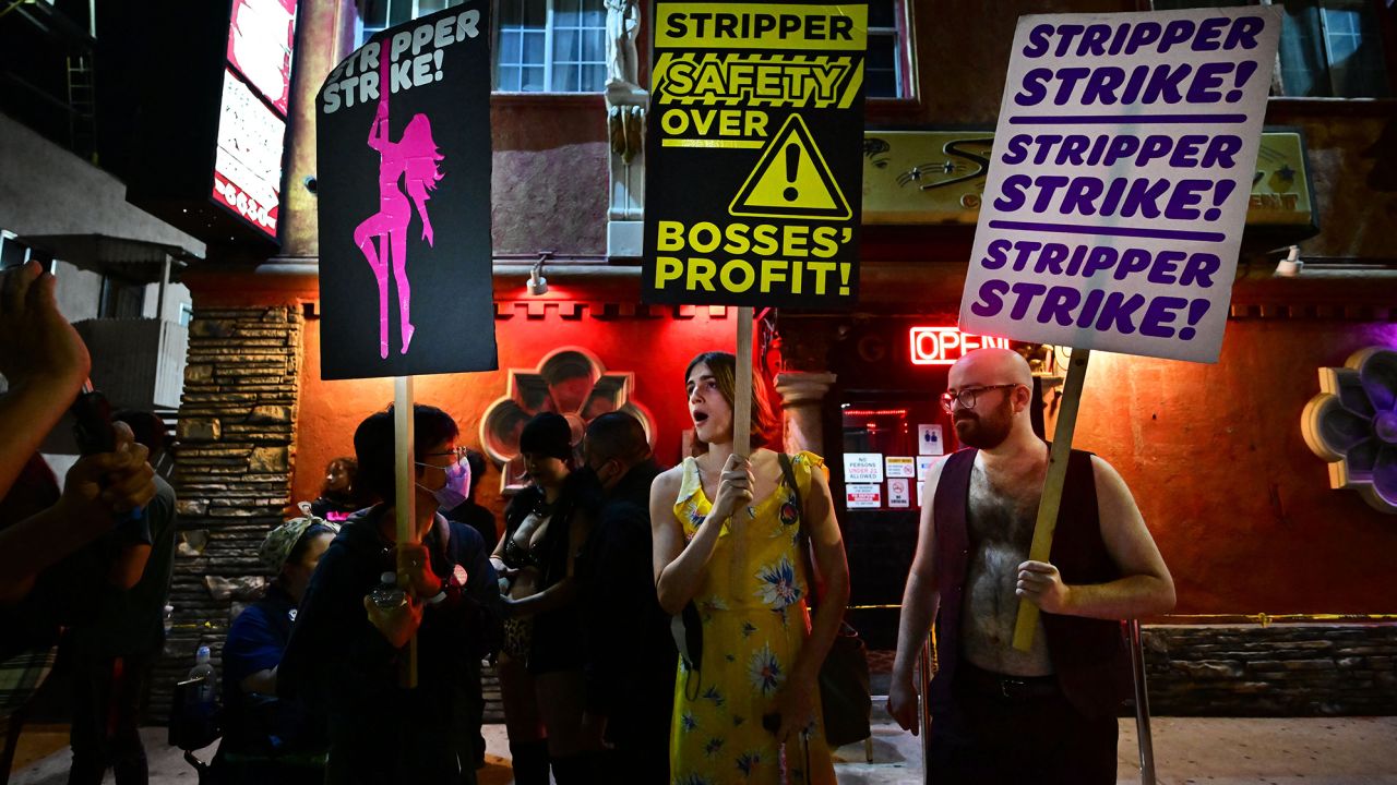 Supporters join strippers for a rally outside the Star Garden Topless Dive Bar on August 19, 2022 in North Hollywood, California. 
