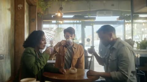 Brits sip turnip lattes in a recent advertisement from Giffgaff. The cellular network has promised to fix its prices for next year.