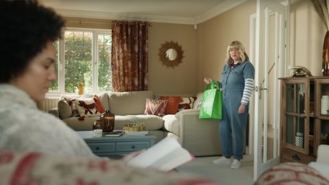 In a recent Dunelm ad, a woman aims to cozy up her home after navigating a topsy-turvy drive up a street called Wits' End.