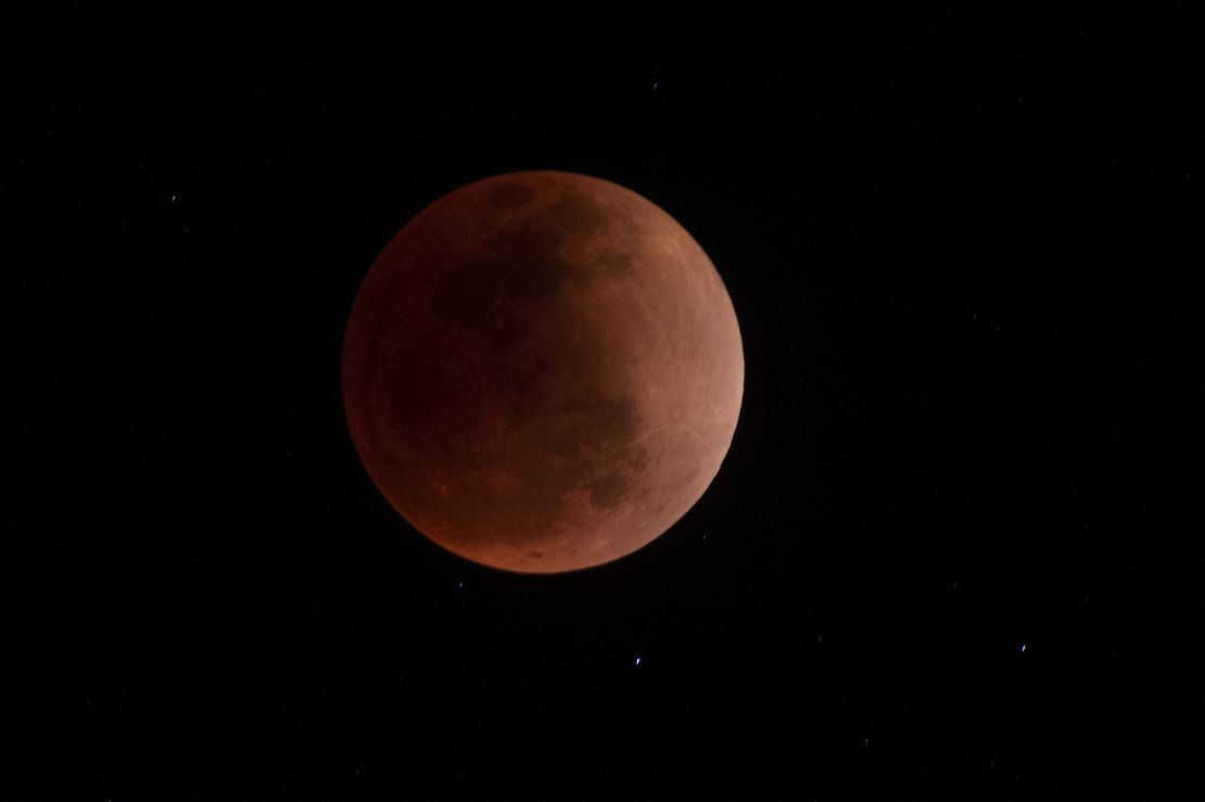 A "blood moon" is visible during a total lunar eclipse in the skies of Canta, Peru, on May 15.