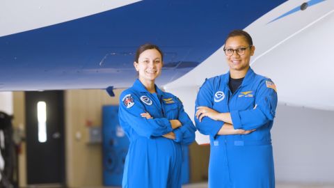 Meteorologist Nikki Hathaway (left) and Lieutenant Commander Danielle Varwig flew on NOAA missions during the 2020 and 2021 hurricane season.