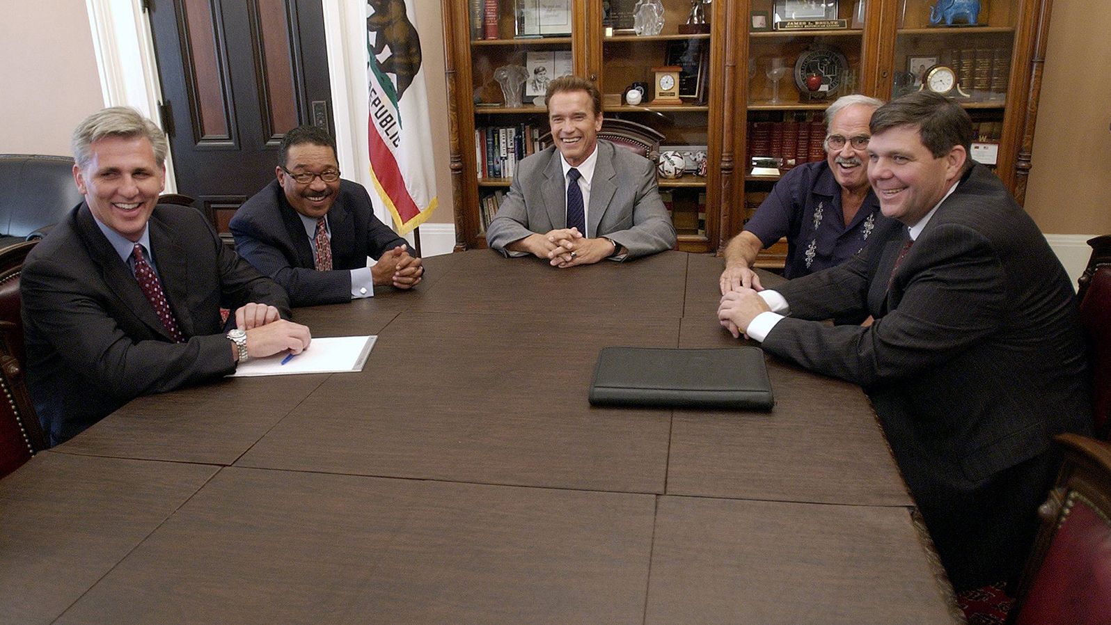 McCarthy, left, meets with California Gov.-elect Arnold Schwarzenegger, center, and other legislative leaders in 2003. McCarthy was elected to the California State Assembly in 2002.