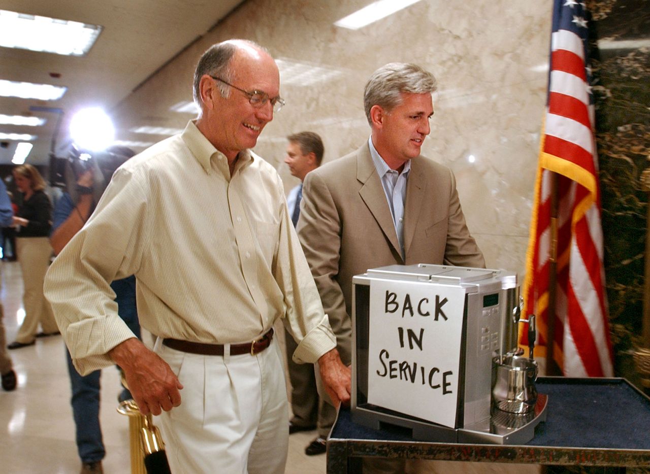 McCarthy and California state Sen. Dick Ackerman wheel a cappuccino machine into Gov. Schwarzenegger's office in July 2004. This was after Democratic state Sen. John Burton, who in the past had delivered freshly brewed coffee to his meetings with Schwarzenegger, announced that he would withhold the services of his coffee maker because Schwarzenegger called his political opponents "girlie men."