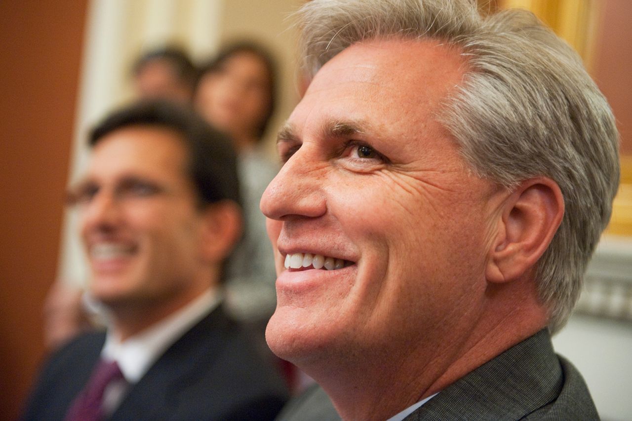 McCarthy and House Majority Leader Eric Cantor brief reporters at the Capitol in September 2011. McCarthy would later succeed Cantor as majority leader in 2014.