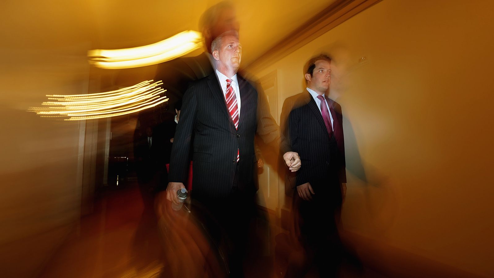 McCarthy, left, arrives for a Republican Conference meeting in 2013.
