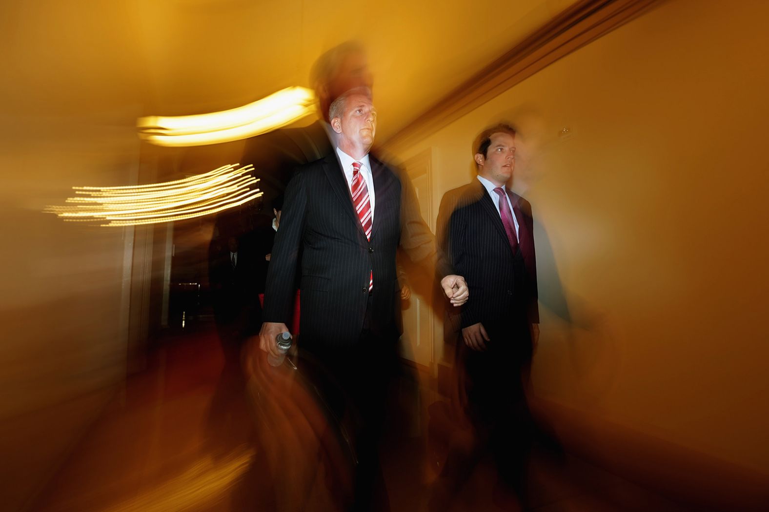 McCarthy, left, arrives for a Republican Conference meeting in 2013.